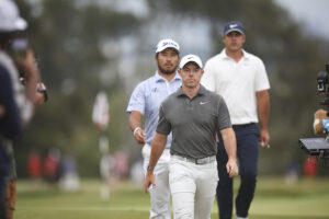 Rory McIlroy strides out ahead of Brooks Koepka and Hideki Matsuyama in round one (Image; James Gilbert/USGA)